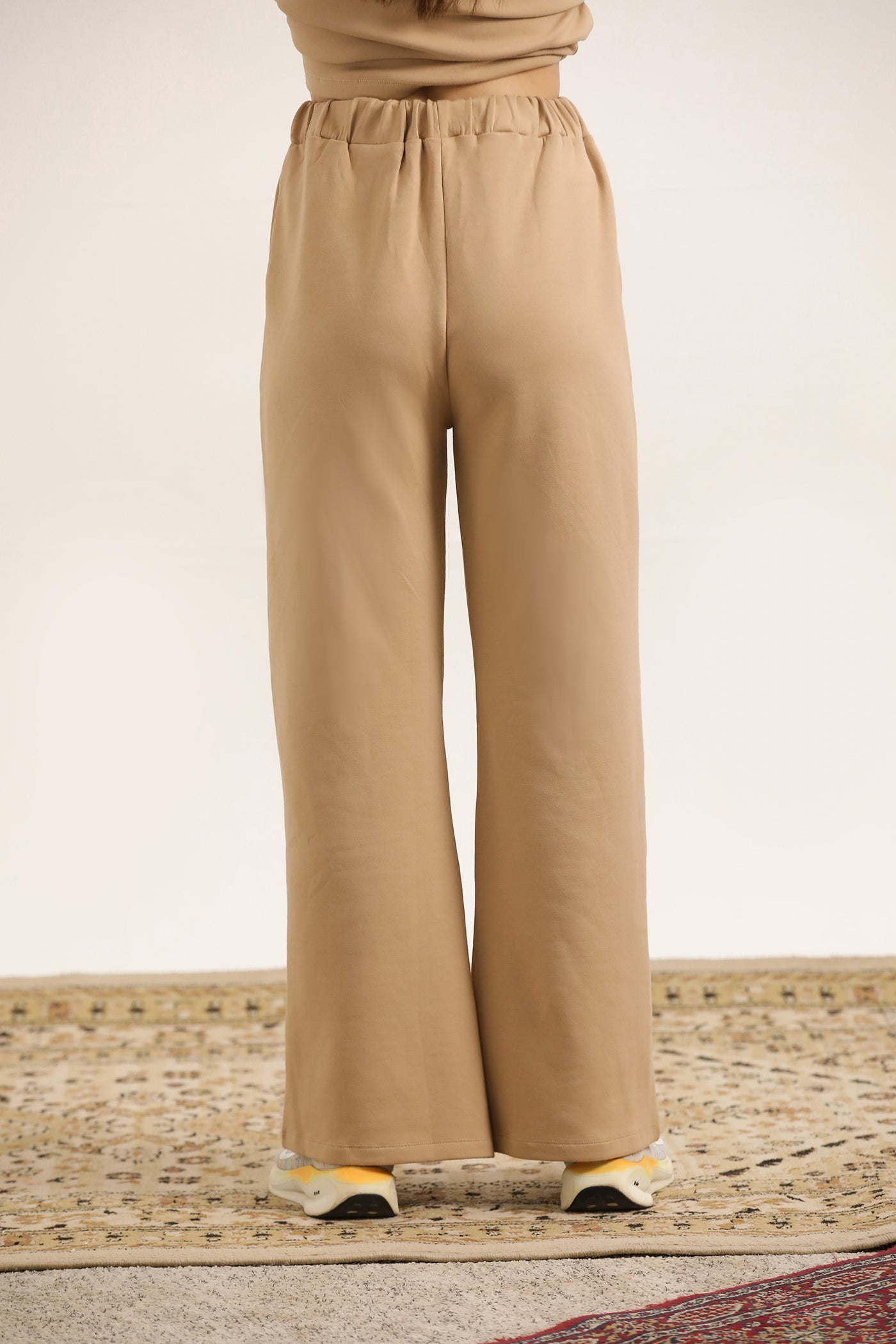 BEIGE FLARED TROUSER WITH SIDE POCKETS