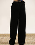BLACK FLARED TROUSER WITH SIDE POCKETS