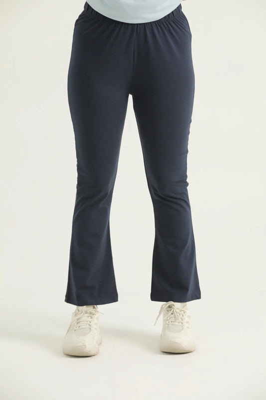 A pair of navy flared leggings with a high waistband, displayed against a white background.