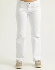 A pair of white straight leg denim jeans with pockets and a metal button zipper fly.