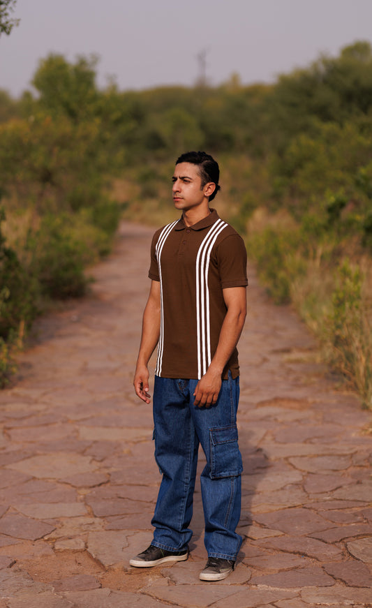 Man standing on a stone path in a natural setting